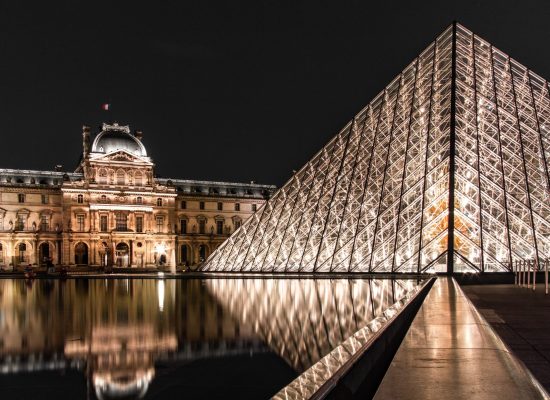 Captivating image representing culture and class on my landing page featuring the Louvre Museum
